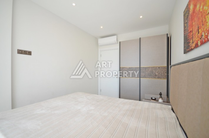 Квартира 1+1 с видом на море на первой береговой линии в Махмутларе, 61 кв.м. - Ракурс 20