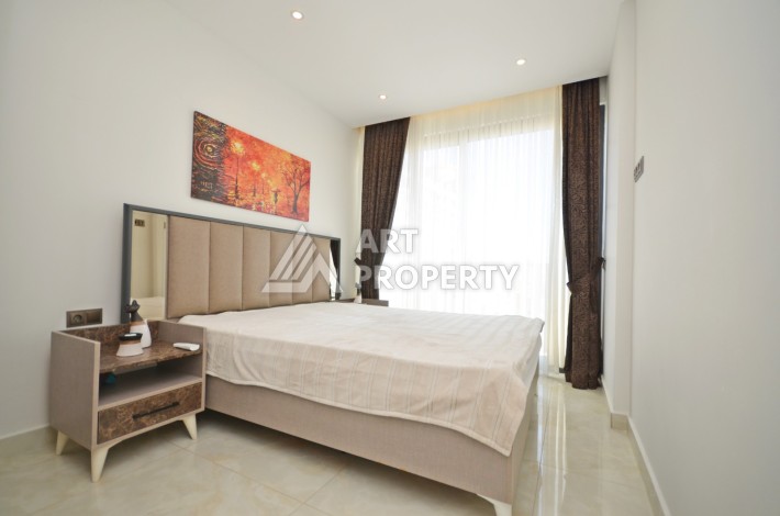 Квартира 1+1 с видом на море на первой береговой линии в Махмутларе, 61 кв.м. - Ракурс 23