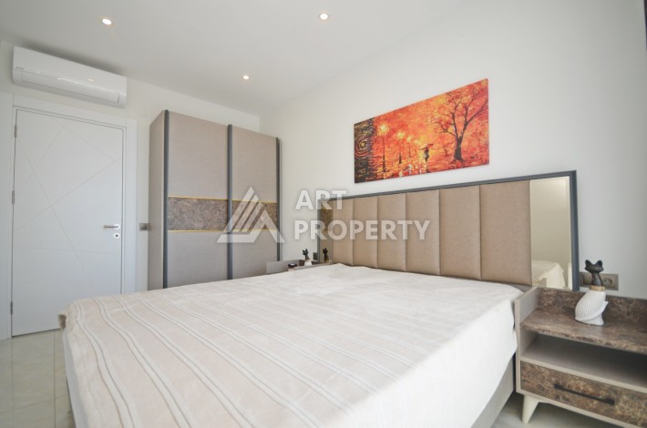 Квартира 1+1 с видом на море на первой береговой линии в Махмутларе, 61 кв.м. - Ракурс 24