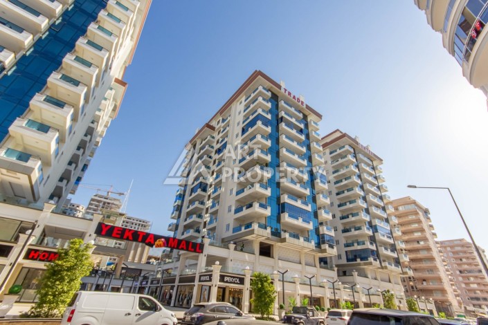 Двухкомнатные меблированные апартаменты 70 кв.м. в резиденции премиум класса в Махмутларе. - Ракурс 2