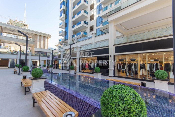 Двухкомнатные меблированные апартаменты 70 кв.м. в резиденции премиум класса в Махмутларе. - Ракурс 28