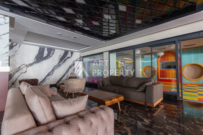 Двухкомнатные меблированные апартаменты 70 кв.м. в резиденции премиум класса в Махмутларе. - Ракурс 30