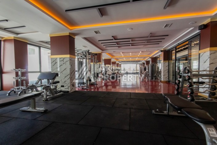 Двухкомнатные меблированные апартаменты 70 кв.м. в резиденции премиум класса в Махмутларе. - Ракурс 44