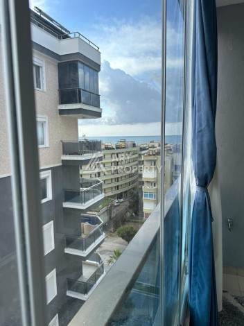 Просторная и светлая квартира 1+1 площадью 60 м2 в 250 м от моря в районе Махмутлар - Ракурс 16