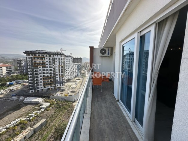 Просторный дуплекс в центре Махмутлара, планировкой 2+1 и площадью 135 м2 в 500 м от моря с видом на горы - Ракурс 2