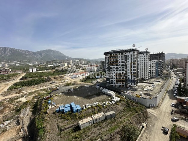 Просторный дуплекс в центре Махмутлара, планировкой 2+1 и площадью 135 м2 в 500 м от моря с видом на горы - Ракурс 5