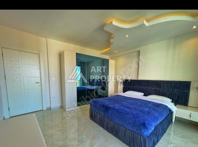 Дуплекс 3+1 с панорамным видом в Махмутларе, 220 кв.м. - Ракурс 12