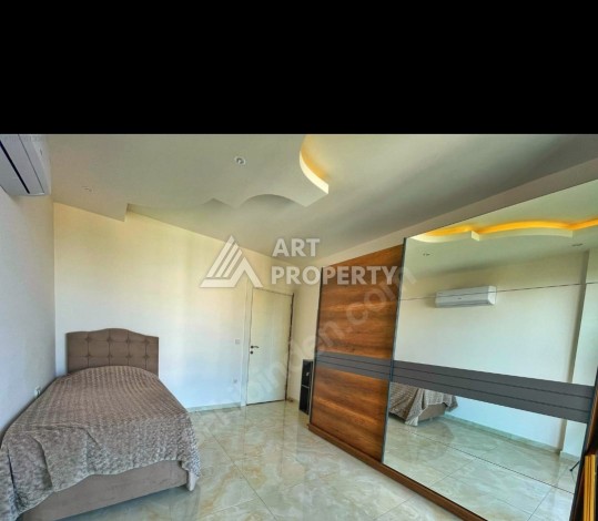 Дуплекс 3+1 с панорамным видом в Махмутларе, 220 кв.м. - Ракурс 13