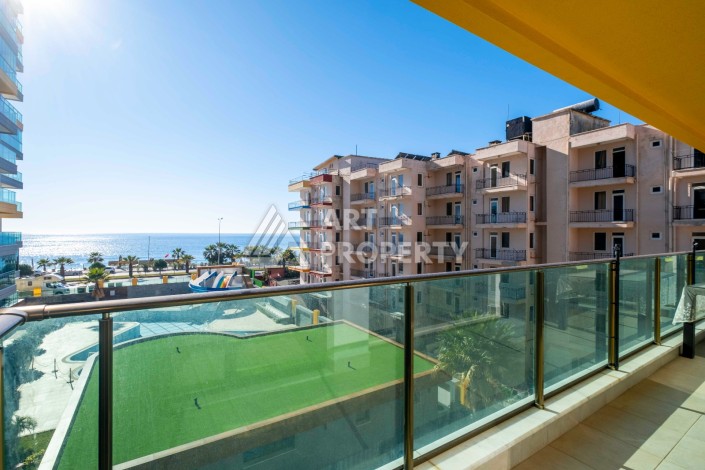 Квартира 2+1 с видом на море на первой береговой линии, 80 кв.м. Махмутлар, Алания - Ракурс 36