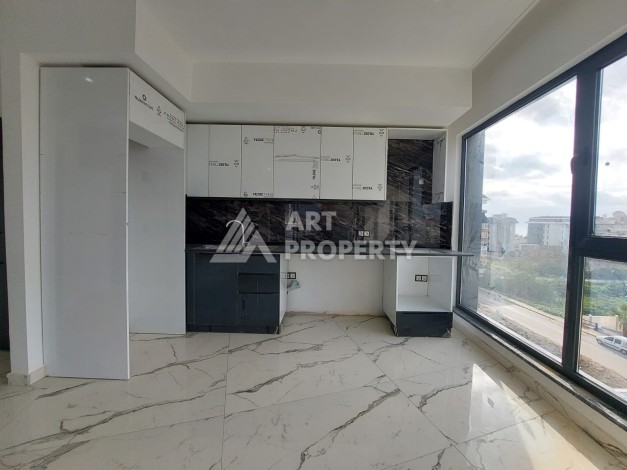 Продажа дуплекса 2+1 , площадью 90 м2 с видом на море  в зеленом районе Кестель в 150 м от пляжа - Ракурс 4