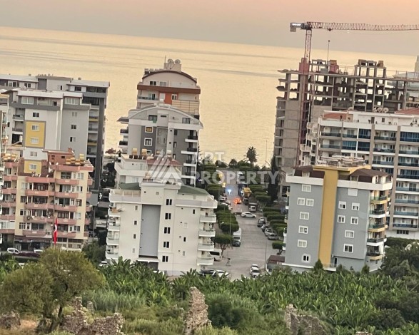 Пентхаус 3+1 с видом на море и Наулу в Махмутларе, 200 кв.м. - Ракурс 40