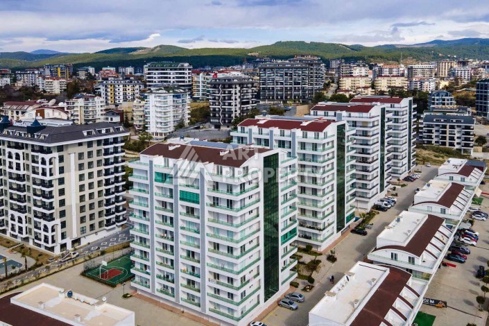 Квартира 1+1 , 58 м2, в центре Авсалара, в комплексе с отельной инфраструктурой - Ракурс 15