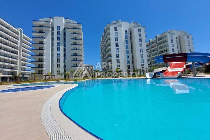 Квартира 1+1 , 58 м2, в центре Авсалара, в комплексе с отельной инфраструктурой - Ракурс 3