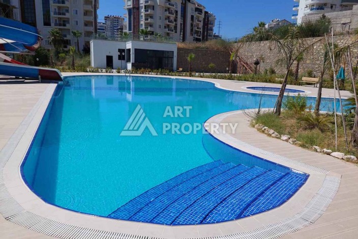 Квартира 1+1 , 58 м2, в центре Авсалара, в комплексе с отельной инфраструктурой - Ракурс 4