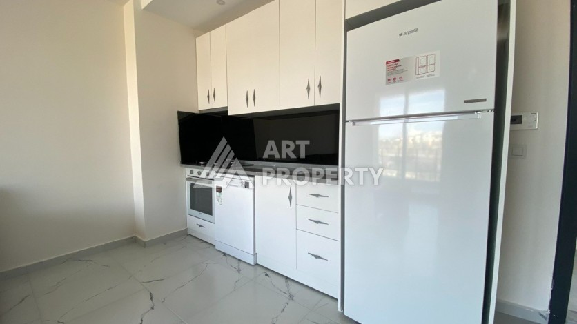 Апартаменты 1+1, 55 м2, в зеленом районе Авсалар - Ракурс 12