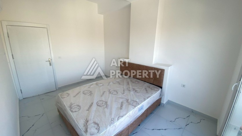 Апартаменты 1+1, 55 м2, в зеленом районе Авсалар - Ракурс 16