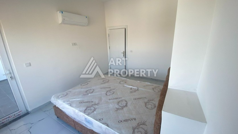 Апартаменты 1+1, 55 м2, в зеленом районе Авсалар - Ракурс 18