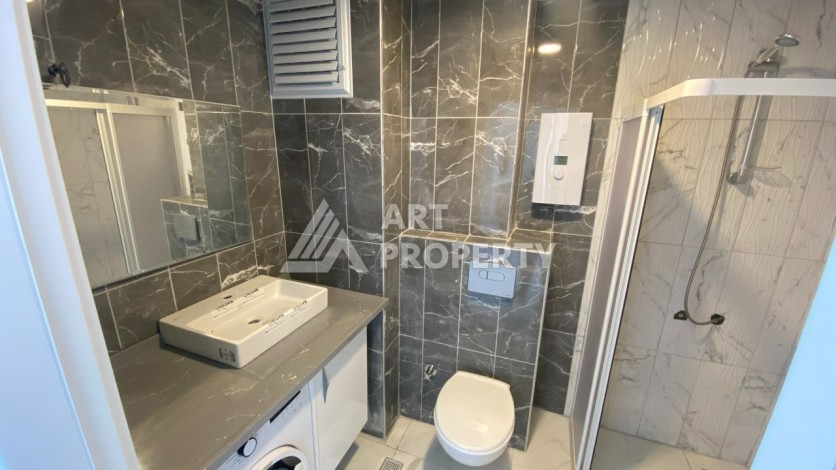 Апартаменты 1+1, 55 м2, в зеленом районе Авсалар - Ракурс 19