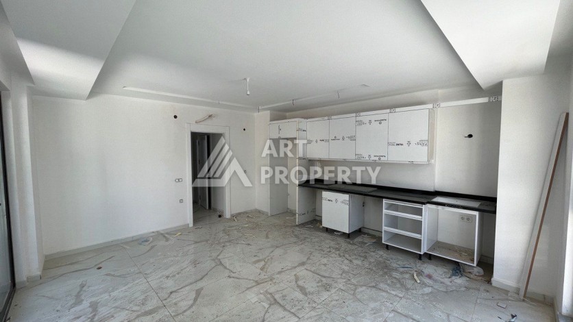 Квартира 1+1 в новом ЖК, 50 кв.м. Махмутлар, Алания. - Ракурс 2