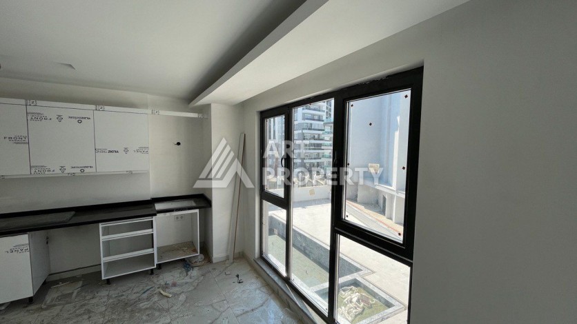 Квартира 1+1 в новом ЖК, 50 кв.м. Махмутлар, Алания. - Ракурс 4