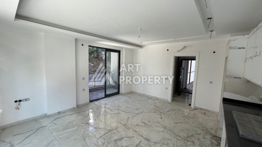 Квартира 1+1 в новом ЖК, 50 кв.м. Махмутлар, Алания. - Ракурс 6