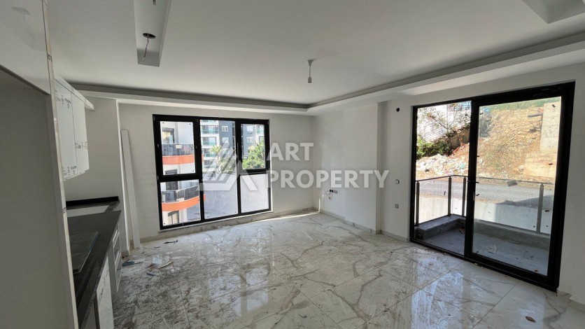 Квартира 1+1 в новом ЖК, 50 кв.м. Махмутлар, Алания. - Ракурс 7