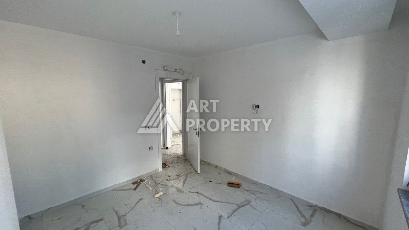 Квартира 1+1 в новом ЖК, 50 кв.м. Махмутлар, Алания. - Ракурс 8