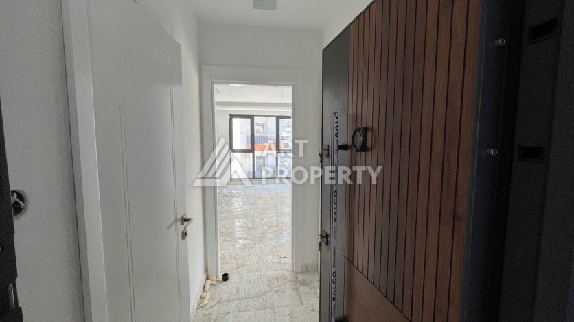 Квартира 1+1 в новом ЖК, 50 кв.м. Махмутлар, Алания. - Ракурс 9