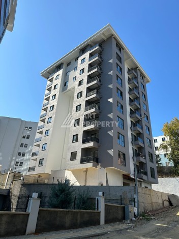 Квартира 1+1 в новом ЖК, 50 кв.м. Махмутлар, Алания. - Ракурс 12