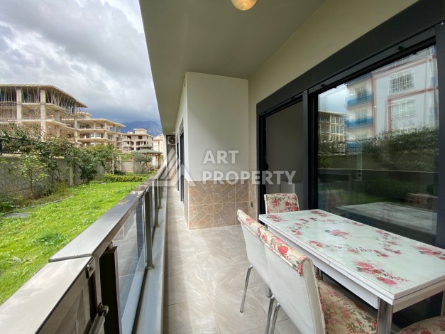 Квартира 2+1 с выходом в сад, 94 кв.м. Оба, Алания. - Ракурс 5