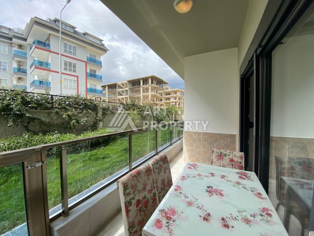 Квартира 2+1 с выходом в сад, 94 кв.м. Оба, Алания. - Ракурс 7