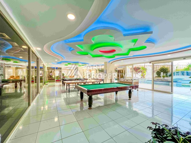 Квартира 1+1 в престижном ЖК в 450 м. от моря в Махмутларе, 65 кв.м. - Ракурс 4