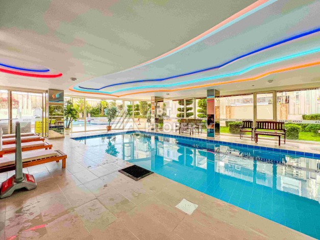 Квартира 1+1 в престижном ЖК в 450 м. от моря в Махмутларе, 65 кв.м. - Ракурс 8