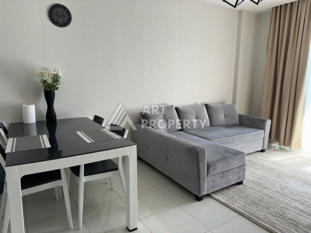 Квартира 1+1 в престижном ЖК в 450 м. от моря в Махмутларе, 65 кв.м. - Ракурс 11