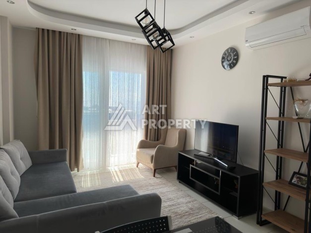 Квартира 1+1 в престижном ЖК в 450 м. от моря в Махмутларе, 65 кв.м. - Ракурс 12