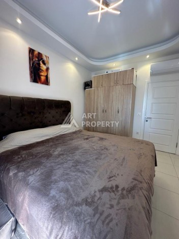 Квартира 1+1 в престижном ЖК в 450 м. от моря в Махмутларе, 65 кв.м. - Ракурс 19