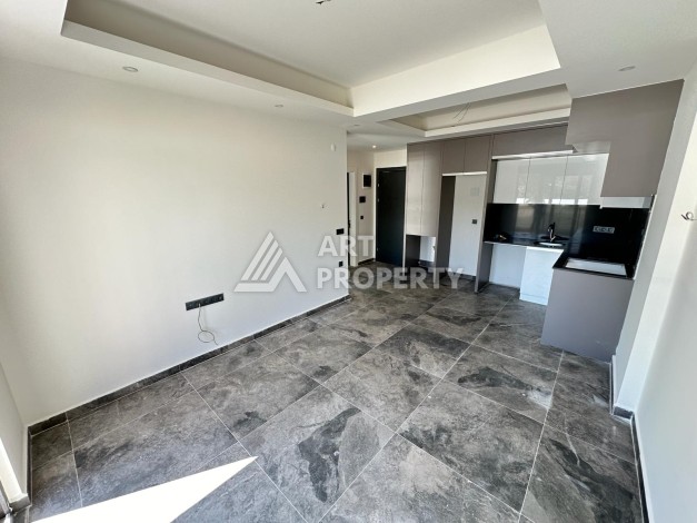 Квартира 1+1 в бутик-комплексе, 55 кв.м. Махмутлар, Алания. - Ракурс 2