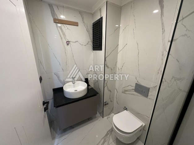 Квартира 1+1 в бутик-комплексе, 55 кв.м. Махмутлар, Алания. - Ракурс 10