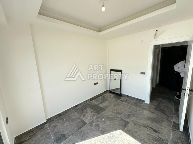 Квартира 1+1 в бутик-комплексе, 55 кв.м. Махмутлар, Алания. - Ракурс 14