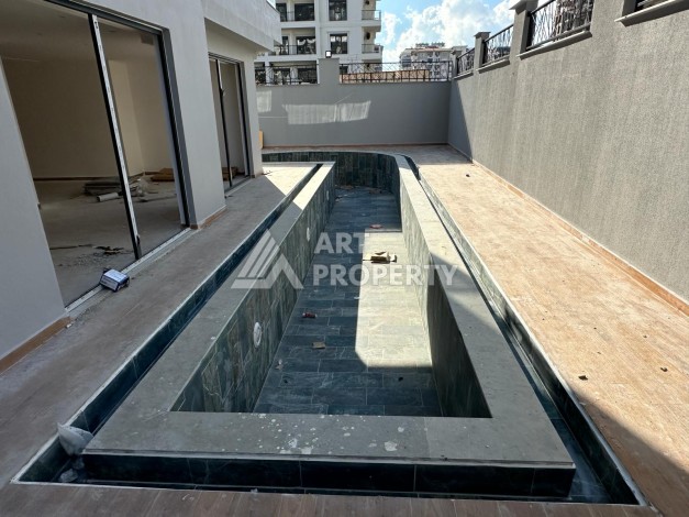 Квартира 1+1 в бутик-комплексе, 55 кв.м. Махмутлар, Алания. - Ракурс 18