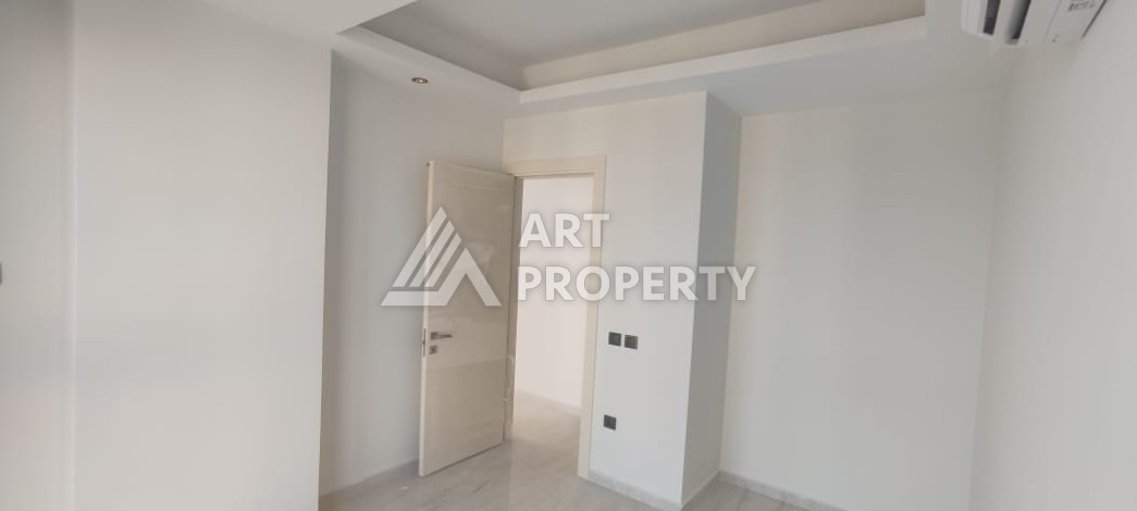 Квартира 2+1 с панорамой на море в Махмутларе, 90 кв.м - Ракурс 7