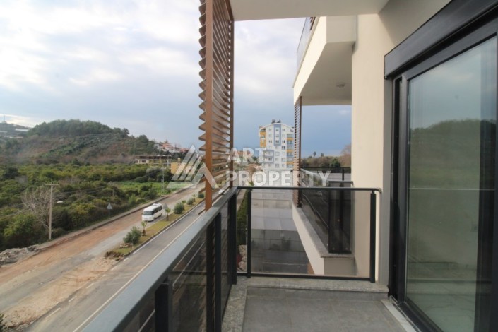 Квартира 1+1 в новом комплексе, 50 кв.м. Демирташ, Алания. - Ракурс 3