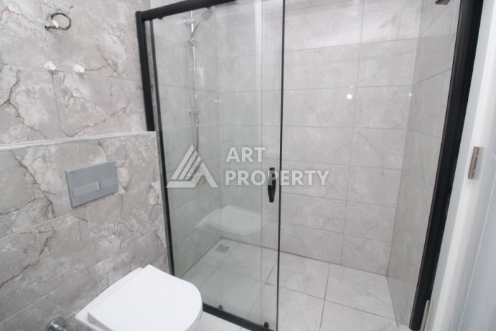 Квартира 1+1 в новом комплексе, 50 кв.м. Демирташ, Алания. - Ракурс 11