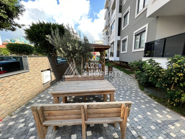 Меблированная квартира 1+1 в новом комплексе, 55 кв.м. Махмутлар, Алания. - Ракурс 37