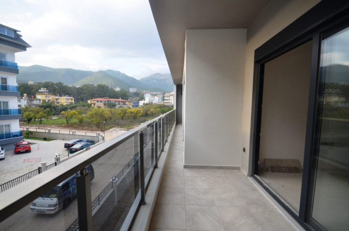 Трехкомнатная квартира с отдельной кухней в новом комплексе в районе Оба, 100 м2 - Ракурс 4