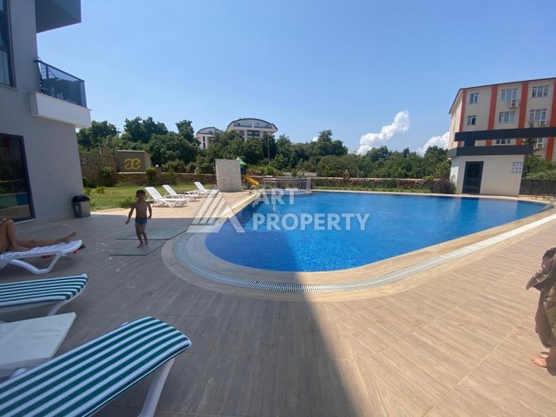 Квартира 1+1 с большой площадью 60 кв.м в открытом районе для внж Оба Алания - Ракурс 7