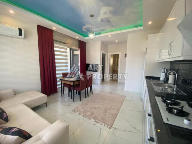 Квартира 1+1 с большой площадью 60 кв.м в открытом районе для внж Оба Алания - Ракурс 21