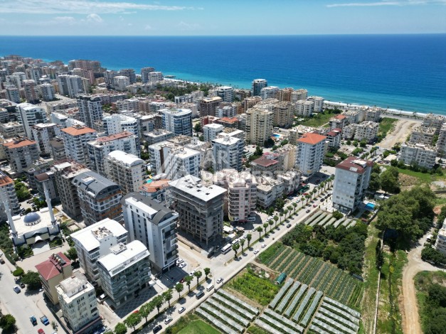 Квартира 1+1  с площадью 60 кв.м всего в 300 метрах в популярном районе Махмутлар - Ракурс 3