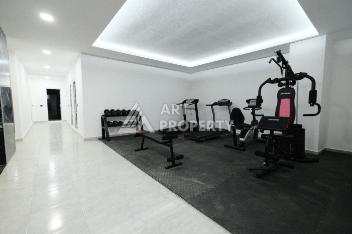 Квартира 1+1  с площадью 60 кв.м всего в 300 метрах в популярном районе Махмутлар - Ракурс 7