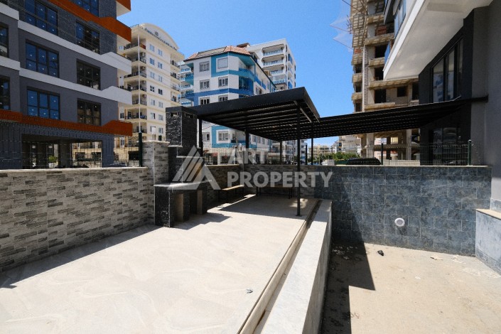 Квартира 1+1  с площадью 60 кв.м всего в 300 метрах в популярном районе Махмутлар - Ракурс 9